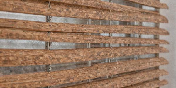 Faux wood blinds with wood-like appearance and durability
