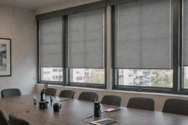 Conference room with professional gray blinds for business meetings